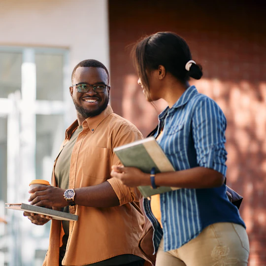 Smiling student couple