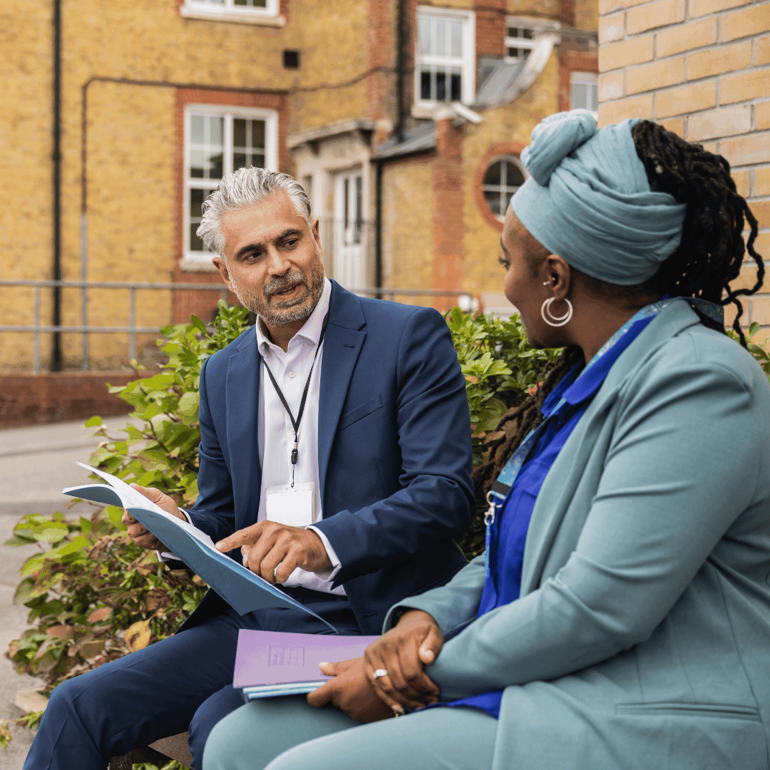 Two HS educators in conversation